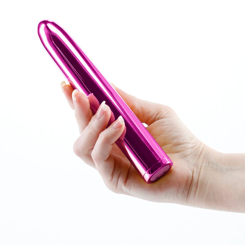 Chroma pink bullet vibrator sideway in hands product | Flirtybay.com.au