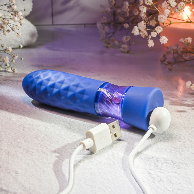 Evolved - raver - bullet vibrator - Product side view, focus on charger  | Flirtybay