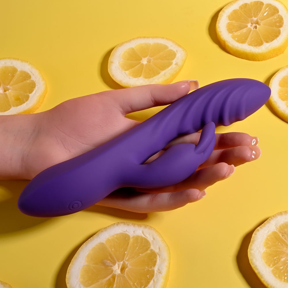 Evolved - wavy rabbit vibrator - Product top view, in a hand  | Flirtybay