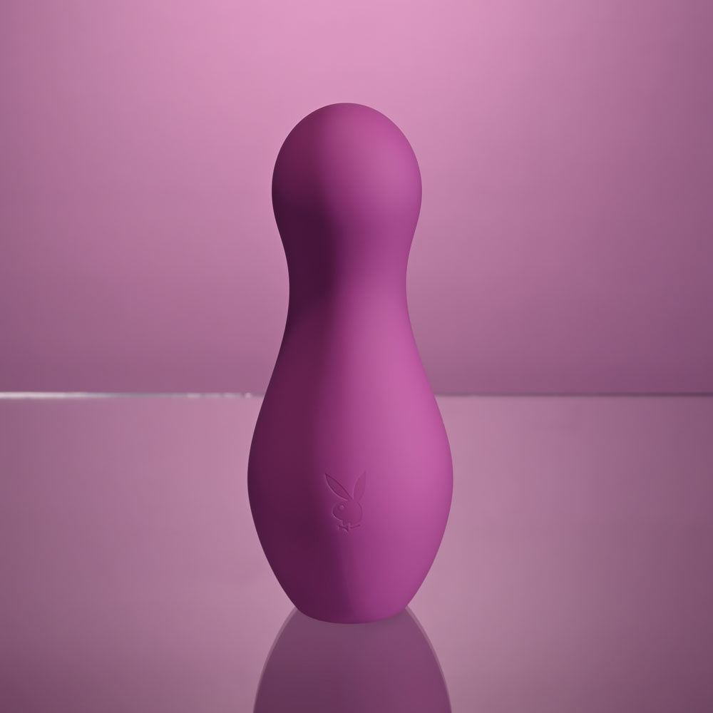 Purple silicone egg-shaped vibrator on a purple background showing on the playboy logo | Flirty Bay adult store and sex tools australia