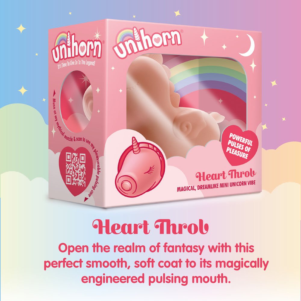 Side view of the Unihorn Heart Throb pulsing clitoral stimulator packaging, with the toy visible inside the box, set against a multicoloured fairy-themed background | Flirty Bay adult store and lingerie store