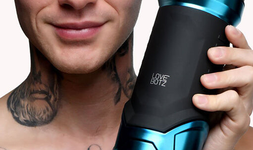 image of man holding Love Botz male masturbator