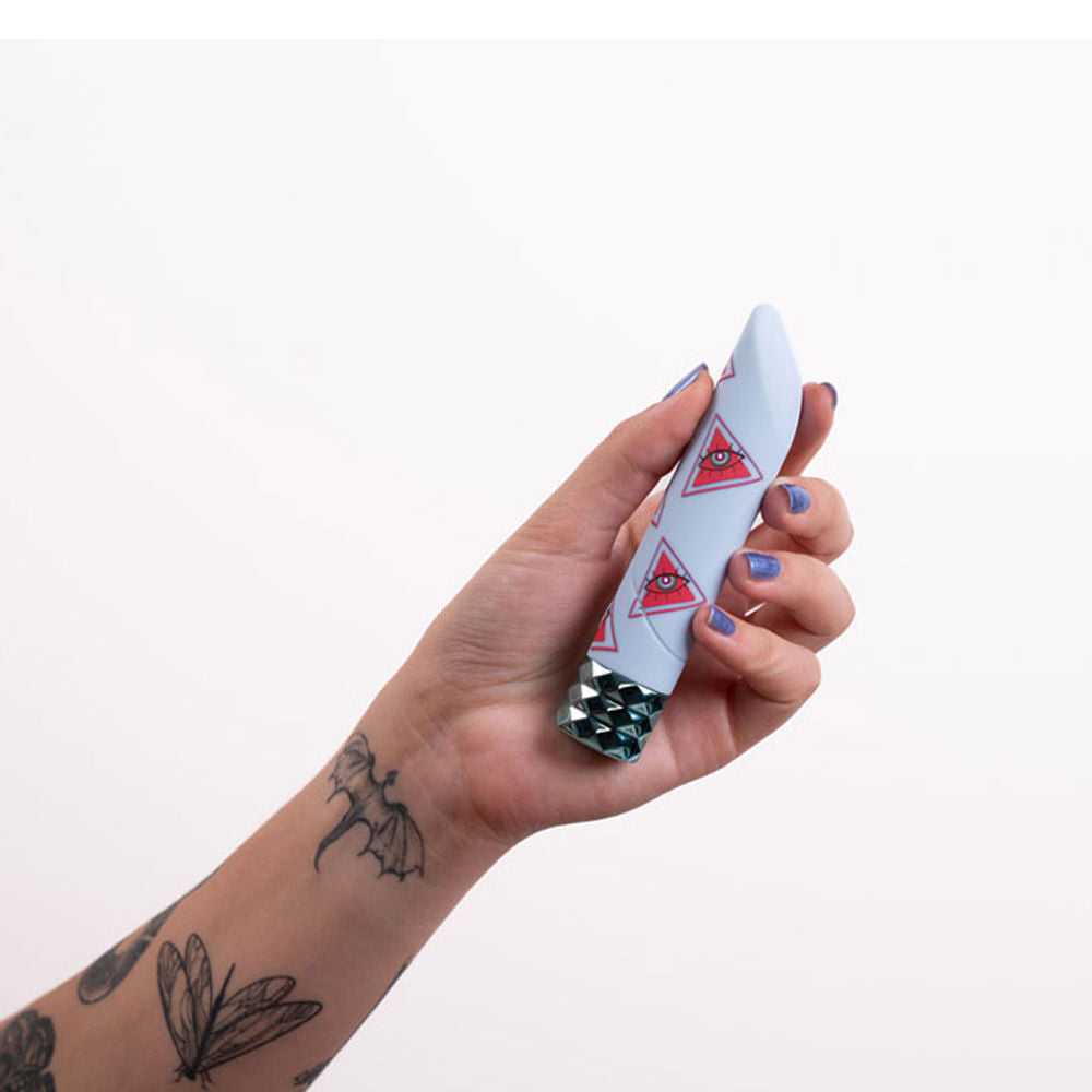 Maia - grateful deb - bullet vibrator - Product side view, in a hand  | Flirtybay