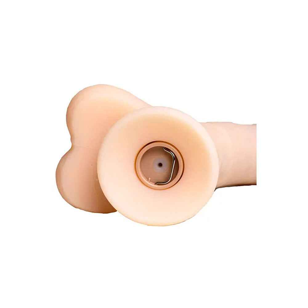 Close-up view of the inside of the suction cup of the Adam & Eve Money Shot Squirter Ejaculating Dildo on a white background | Flirty Bay, dildo Perth Australia