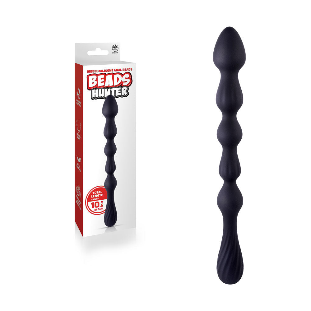 A black, beaded anal bead with a rounded tip, shown next to its packaging which highlights the product's features and includes a red '10+' for indicating its size  on a clear white background | Flirty Bay, anal plug adult store Australia