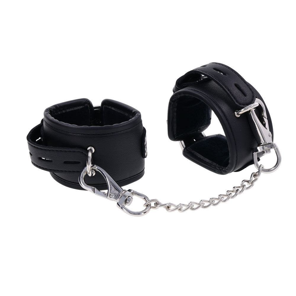Edge black padded handcuffs with silver metal buckle and tether displayed front-facing | Flirty Bay adult toys online, best sex tools