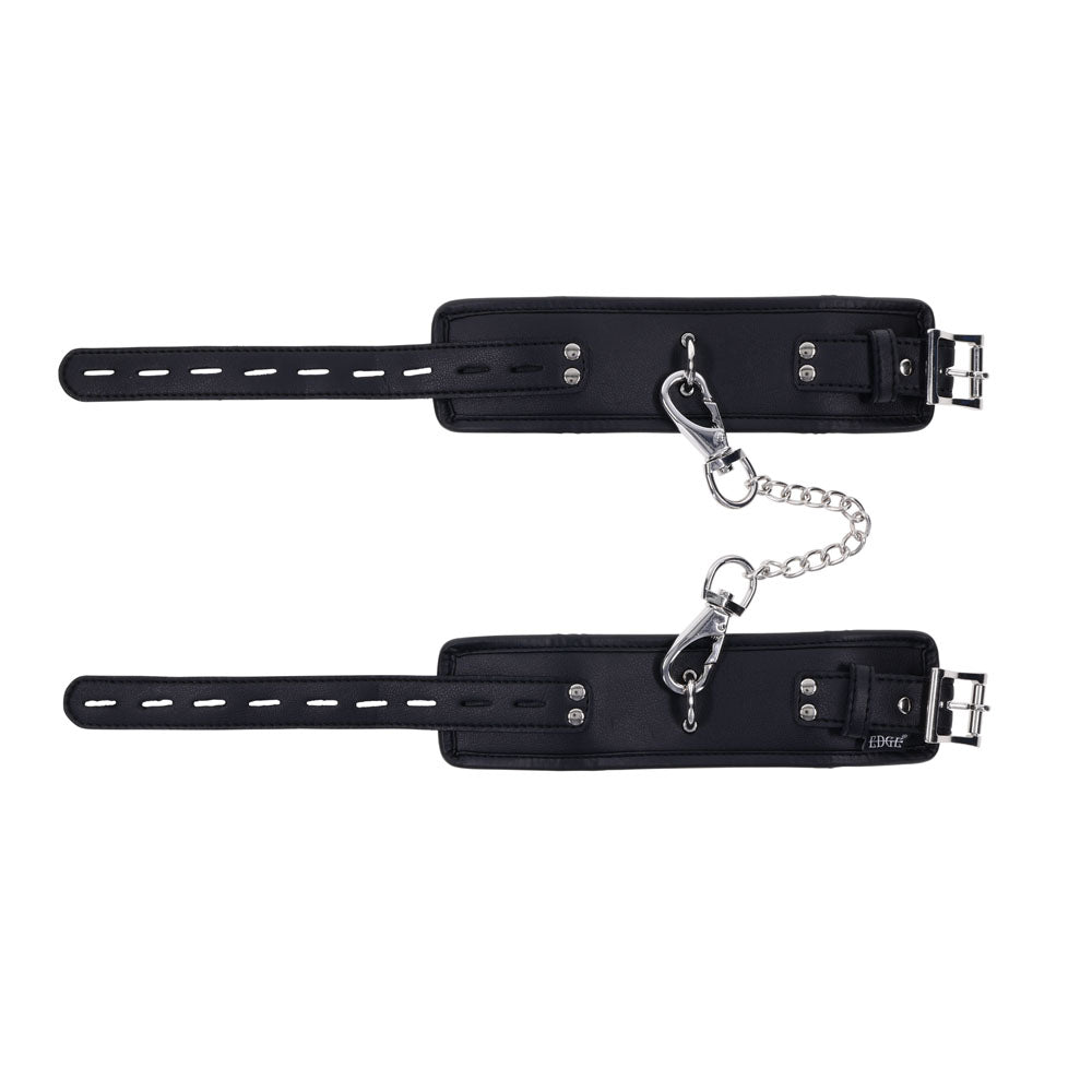 Top view of EDGE handcuffs showing the black faux leather exterior and silver metal buckle | Flirty Bay adult toys online, best sex tools
