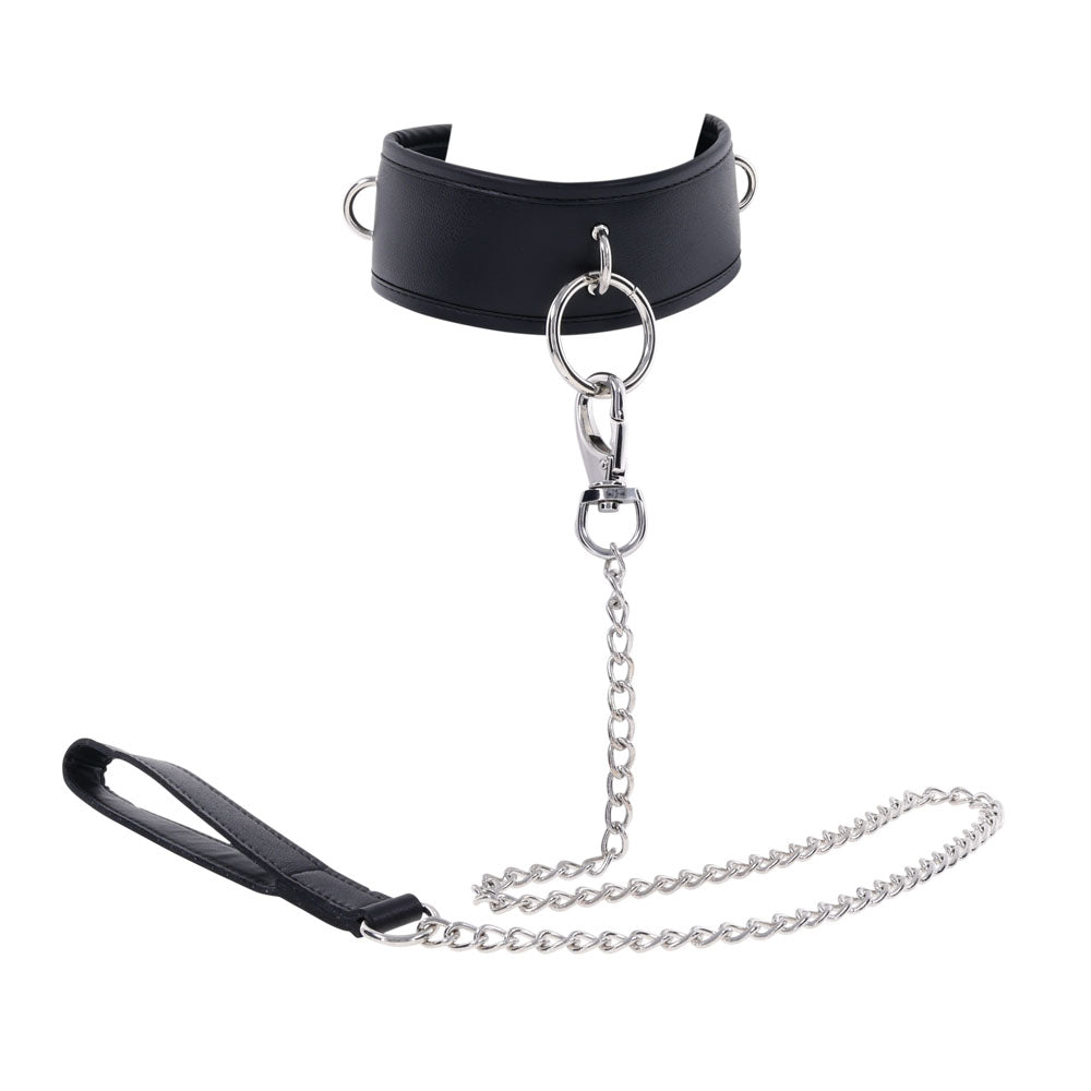 Black leather bondage collar worn on neck with silver leash attached, styled for BDSM aesthetic | Flirty Bay adult toys online, best sex tools