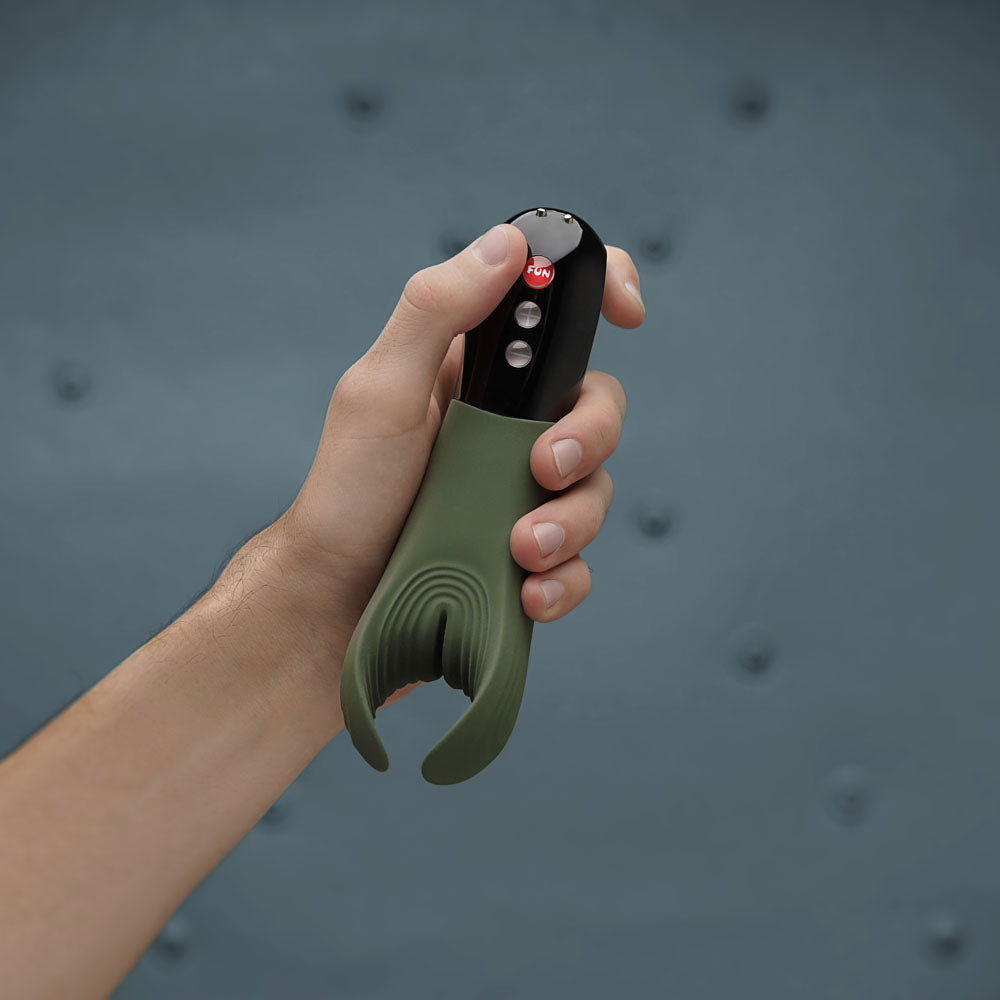 Top view of Green Fun Factory Manta Moss male masturbator on grey background | Flirty Bay Adult Store and Strokers in Perth Australia