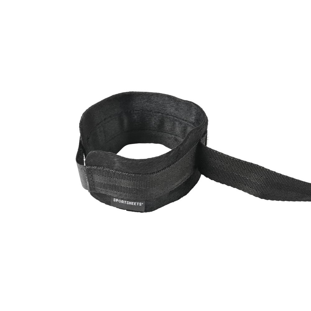 Kinky sex toys – Close-up of a soft padded BDSM handcuff from the Velvet Noir hog tie set, showing texture and hook-and-loop closure | Flirty Bay, bondage sex tools, bondage, adult store Australia