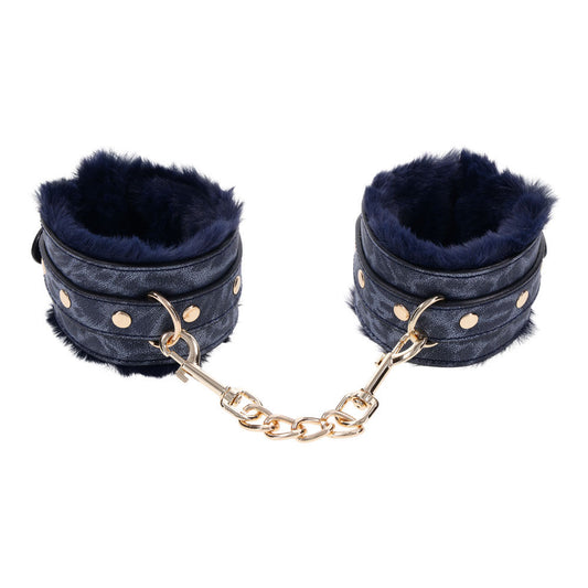 Navy blue faux fur sex handcuffs with gold chain and buckles for luxurious bondage play, focus view | Flirty Bay online adult store, adult toys and lingerie