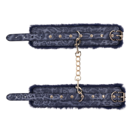 Navy blue faux fur sex handcuffs with gold chain and buckles for luxurious bondage play, unfolded handcuffs top view | Flirty Bay online adult store, adult toys and lingerie