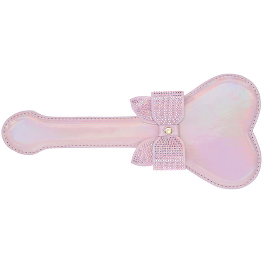 Heart-shaped pink iridescent paddle from the Ouch! Paris Collection with rhinestone bow detailing, made of bonded leather, top view| Flirty Bay online adult store, adult toys and lingerie