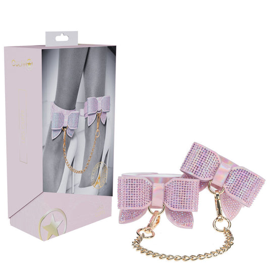 irresistible ankle restraints, crafted to blend sensual control from the Ouch! Paris Collection with rhinestone bow detailing, made of bonded leather, display packaging | Flirty Bay online adult store, adult toys and lingerie