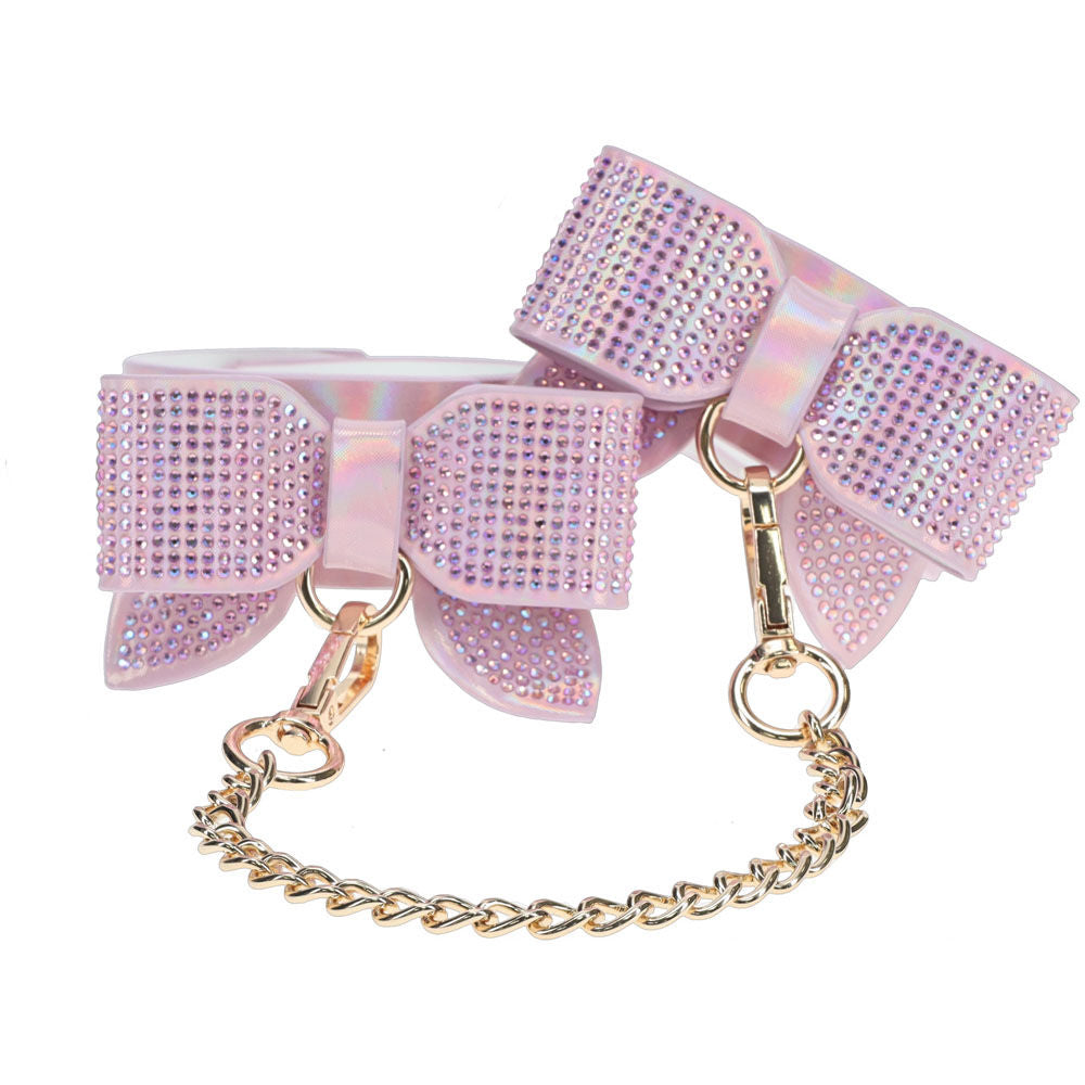 irresistible ankle restraints, crafted to blend sensual control from the Ouch! Paris Collection with rhinestone bow detailing, made of bonded leather, front view | Flirty Bay online adult store, adult toys and lingerie