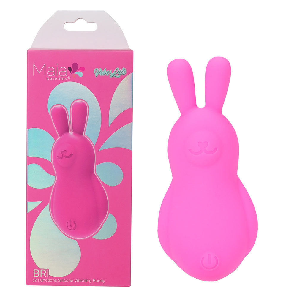 Front view of the pink Maia Bri rechargeable vibrating bunny bullet with packaging on the left on a white background | Flirty Bay, sex toys Australia