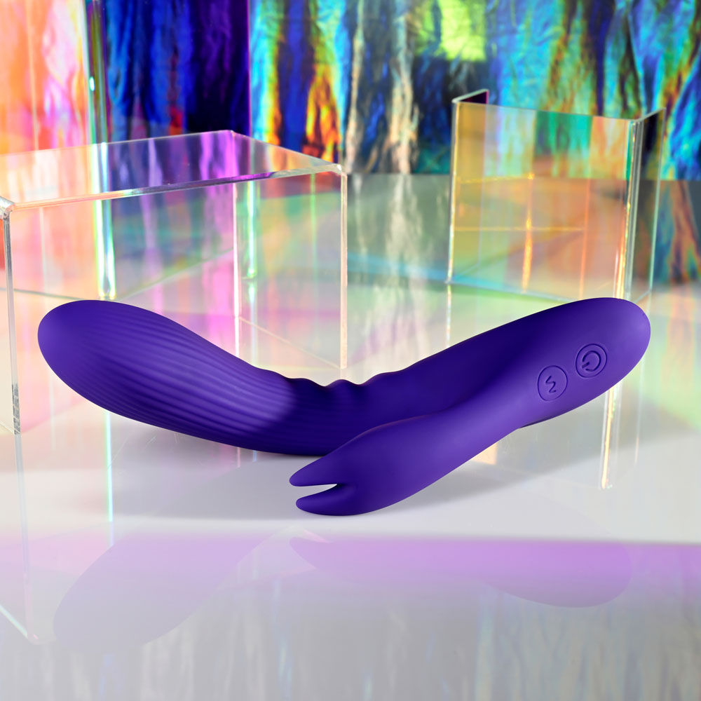 Top front view of Selopa Poseable Bunny Rabbit Vibrator in a disco decor | Flirty Bay, sex toys Australia
