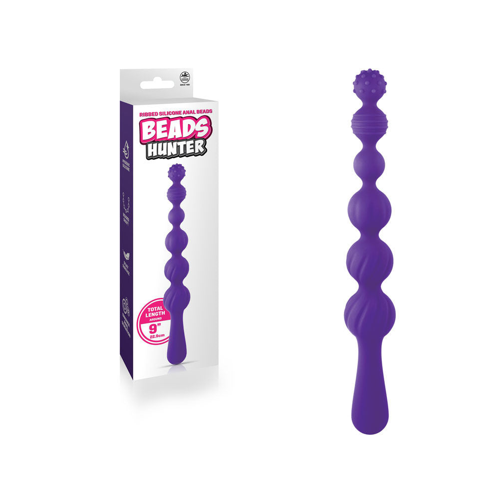 Front view of purple silicone anal beads with packaging on the left side, featuring smooth beaded shaft and hygienic silicone design | Flirty Bay, anal plug adult store Australia