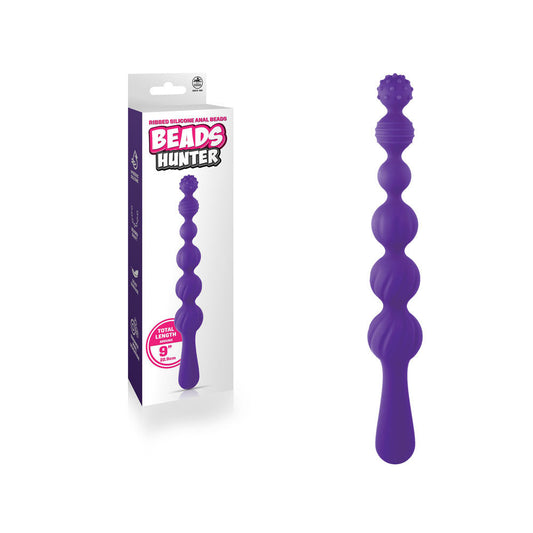 Front view of purple silicone anal beads with packaging on the left side, featuring smooth beaded shaft and hygienic silicone design | Flirty Bay, anal plug adult store Australia