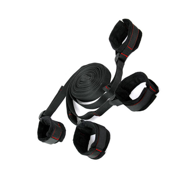 Under-the-mattress bondage restraint kit with four adjustable straps and soft Velcro cuffs for secure and comfortable BDSM play, focus on cuffs product | Flirty bay online adult store, adult toys and lingerie