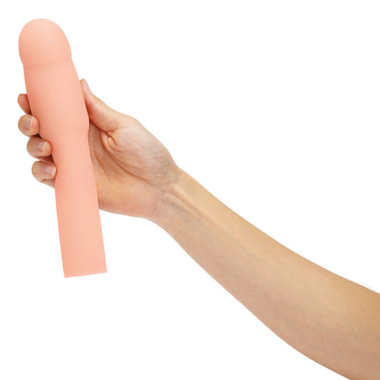 Front view of the flesh Size Up Realistic Penis Extender 4 held in a woman’s hand | Flirty Bay, male sex toys in Perth Australia