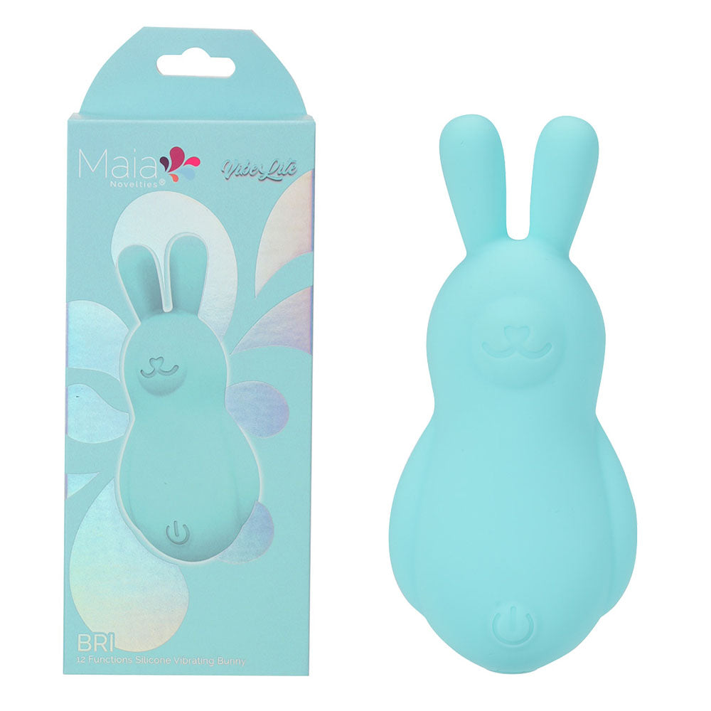 Front view of the teal Maia Bri rechargeable vibrating bunny bullet with packaging on the left on a white background | Flirty Bay, sex toys Australia