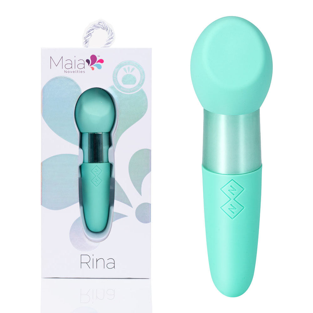 Front view of the teal Maia Rina bullet vibrator with packaging on the left on a white background | Flirty Bay, sex toys Australia