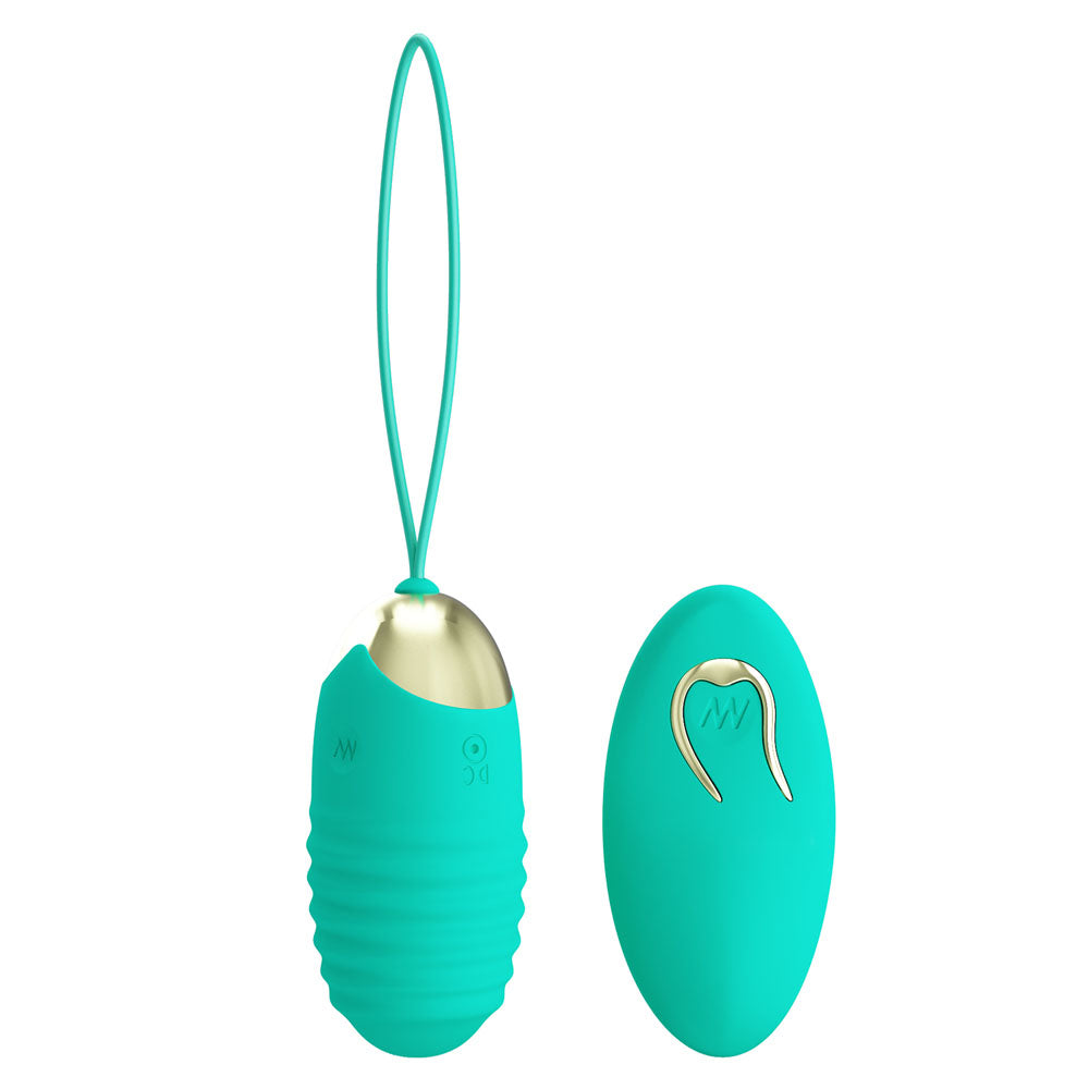 Front view of the teal Party Up Ivan egg vibrator with wireless remote on the right side on a white background | Flirty Bay, sex toys Australia