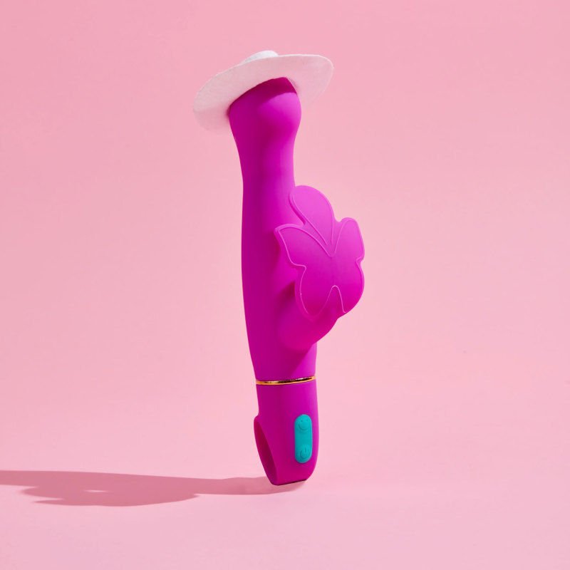 Aria naughty af - g-spot vibrator - Product side view, with a hat  | Flirtybay.com.au