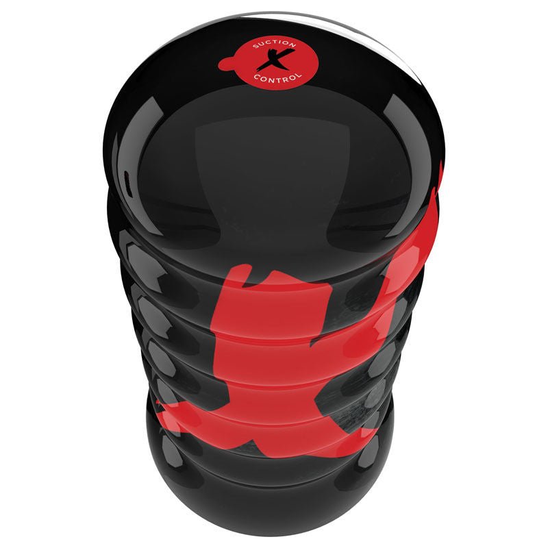 Top-down shot of the PDX Elite Ass-gasm Vibrating Kit male masturbator closed, highlighting the compact design and smooth surface on a white background. | Flirty Bay adult store Perth