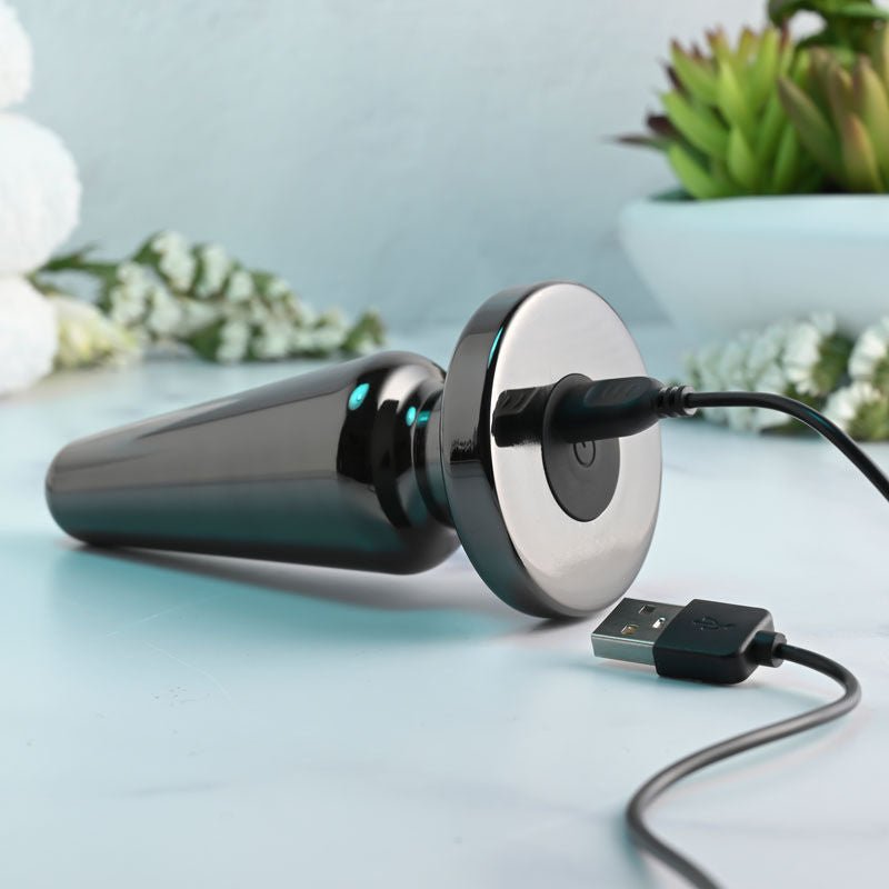 Evolved - advanced vibrating metal plug - Product bottom view, focus on charger  | Flirtybay.com.au