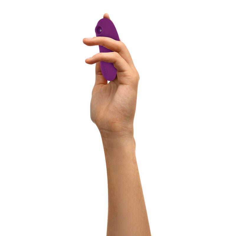Evolved - sucker for you - suction vibrator - Product side view, in a hand  | Flirtybay.com.au