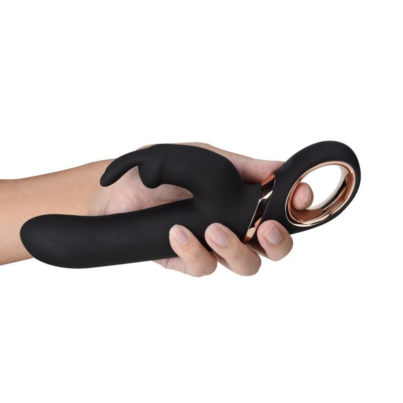 Lush victoria - rabbit vibrator - Product side view, in a hand  | Flirtybay.com.au