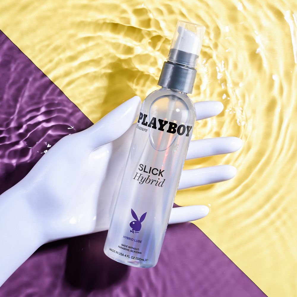 Playboy pleasure - slick hybrid lubricant - 120 ml - Product top view, top in a hand  | Flirtybay.com.au