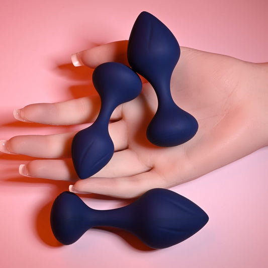 Playboy pleasure tail trainer - butt plugs - Product top view, in a hand  | Flirtybay.com.au