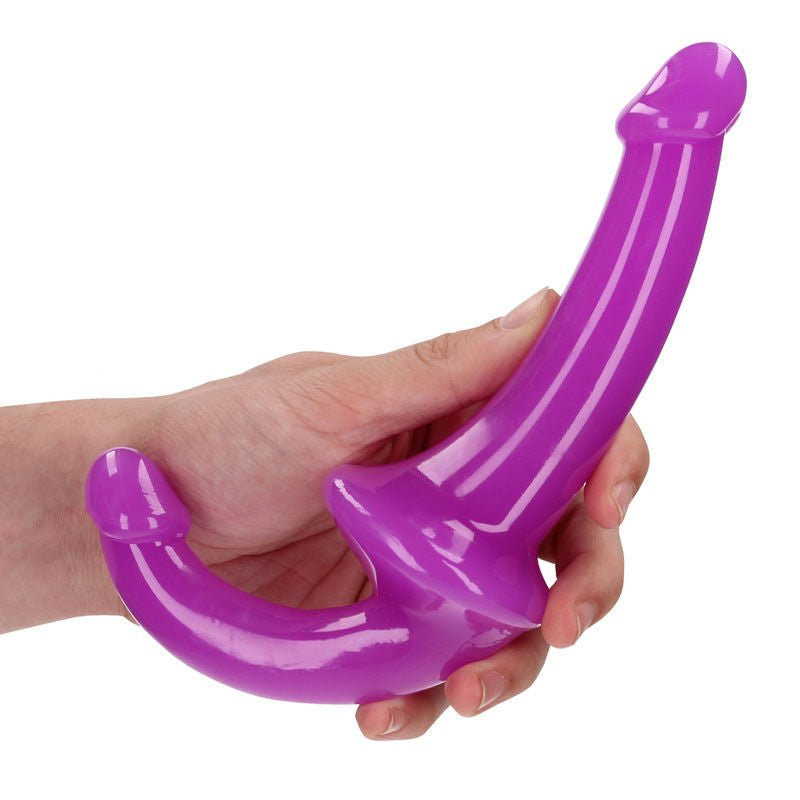 Realcock - 13.5 cm strapless strap-on glow in the dark - Purple, Product side view, in a hand  | Flirtybay.com.au