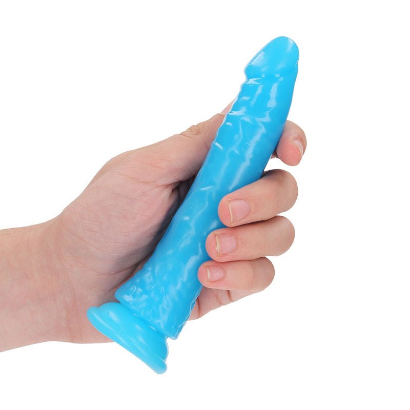 Realcock - 15.5 cm glow in the dark dildo - blue, Product side view, on a hand  | Flirtybay.com.au