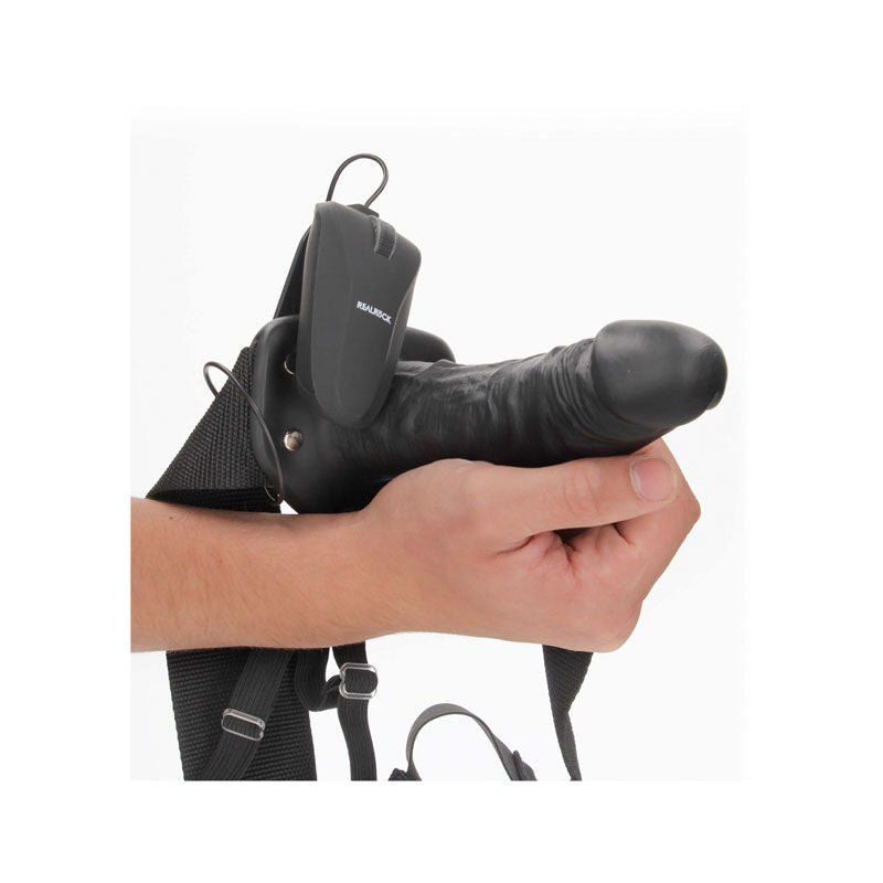 Realcock - 6.1" vibrating hollow strap-on - Product side view, in a hand for sizes  | Flirtybay.com.au