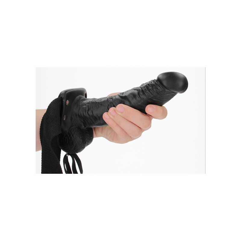 Realcock - 7" hollow strapon with balls - Product side view, in a hand for sizes  | Flirtybay.com.au