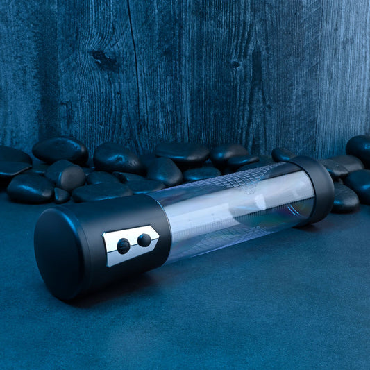 Clear penis pump with measurement markings, textured grip, and removable silicone sleeve for size enhancement and erection support, top view | Flirty bay online adult store, adult toys and lingerie